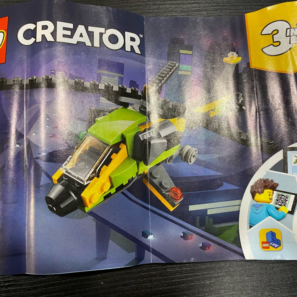 LEGO creator set 3 in 1.  Includes airplane, helicopter and boat builds.